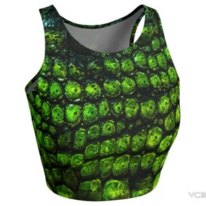 May include: Green and black crop top with a reptile skin pattern.