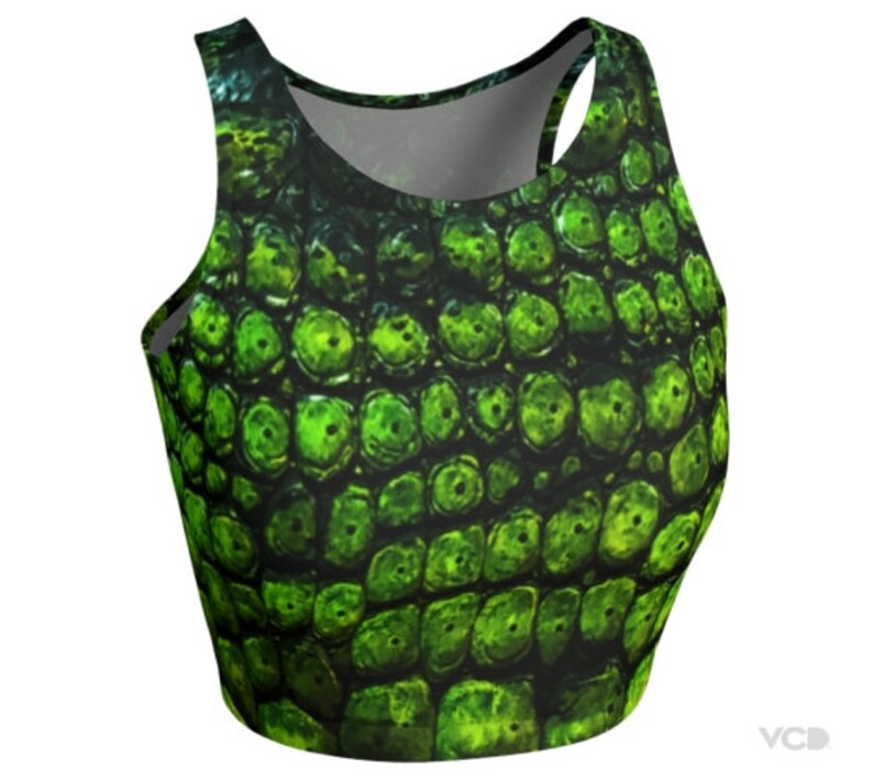 May include: Green and black crop top with a reptile skin pattern.