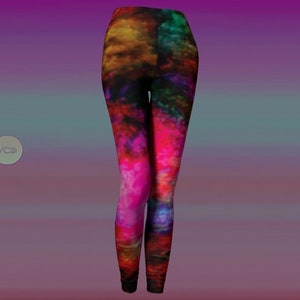 May include: A pair of leggings with a colorful abstract print featuring shades of pink, red, orange, yellow, green, and blue. The print resembles a nebula or galaxy.