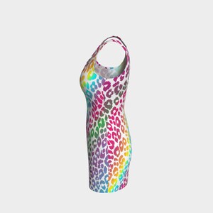 May include: A sleeveless dress with a rainbow leopard print pattern. The dress is fitted and has a scoop neck.