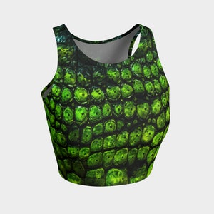 May include: Green crop top with a reptile skin pattern.