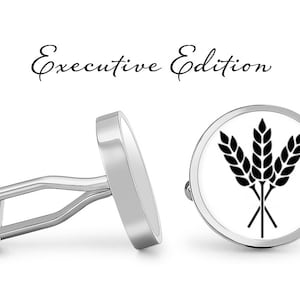 May include: A pair of silver cufflinks with a white background and a black wheat design. The cufflinks are labelled "Executive Edition".