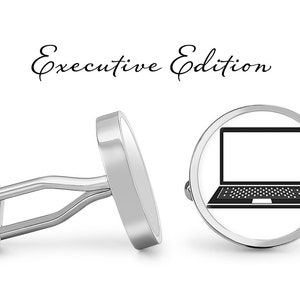 May include: Silver cufflinks with a black and white laptop design. The cufflinks are labeled "Executive Edition".