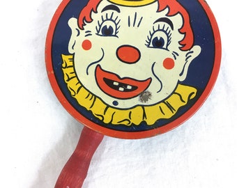 Vintage KIRCHHOFF Holiday Party Tin Noise maker Clown Face Tow surprise #B31