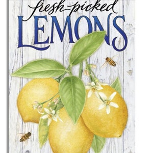 May include: A white wood background with the text "fresh-picked LEMONS" in blue and black lettering. Three yellow lemons with green leaves and white flowers hang from a branch.