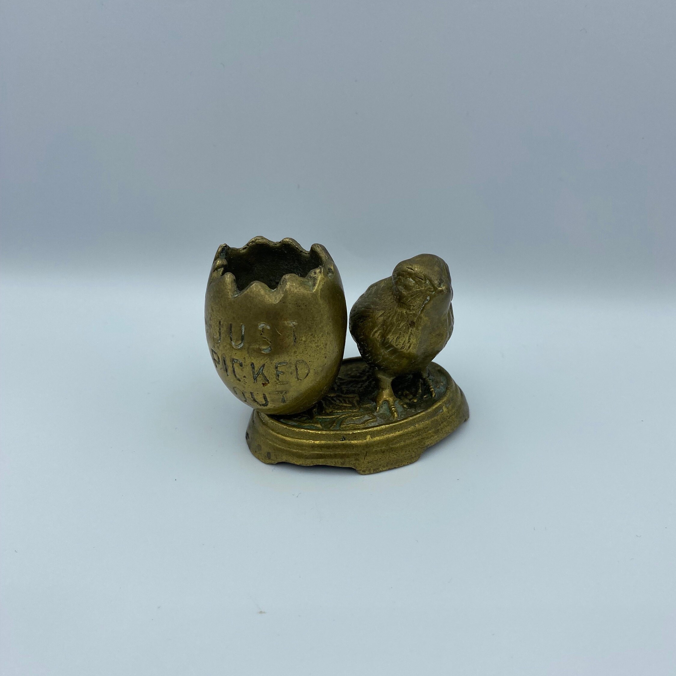 Unusual old brass egg cup CLAW holder RARE