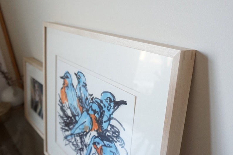 Handcrafted maple frame with traditional wood joinery, expertly crafted for conserving artwork. Enhanced with UV-blocking glazing for added protection. Elevate your art with our meticulously made, timeless frame