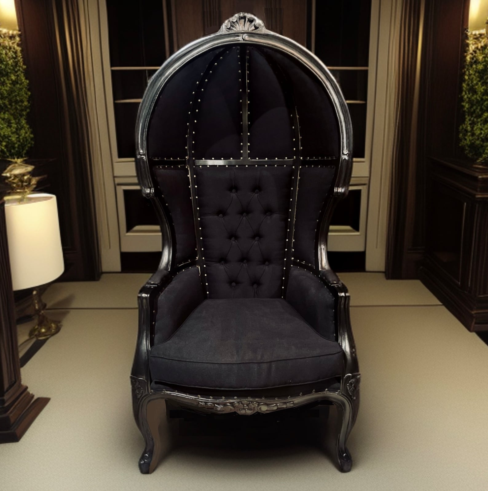 Black velvet balloon chair with dome canopy and gothic detailing in a dark-paneled room, ideal for BDSM dungeon throne seating