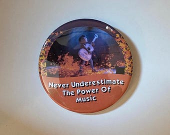 Never Underestimate the Power of Music Celebration Button