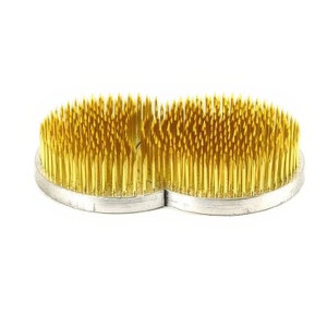 May include: A double-ended floral foam with a heart shape and gold-colored pins. The foam is designed for arranging flowers and other floral elements.