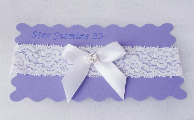 Wedding garter ivory bridal garter ivory lace garter white bow garter rhinestone garter rhinestone bow lace garter toss garter lace garter