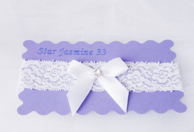 Wedding garter ivory bridal garter ivory lace garter white bow garter rhinestone garter rhinestone bow lace garter toss garter lace garter