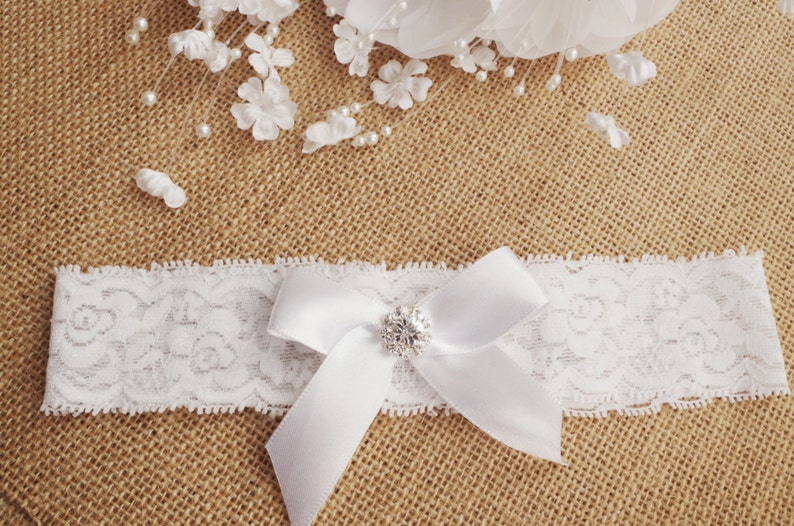 Wedding garter ivory bridal garter ivory lace garter white bow garter rhinestone garter rhinestone bow lace garter toss garter lace garter