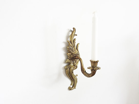 Vintage brass sconce for single candle, wall candlestick or candleholder, French aesthetic interior gold color, elegant swirl design