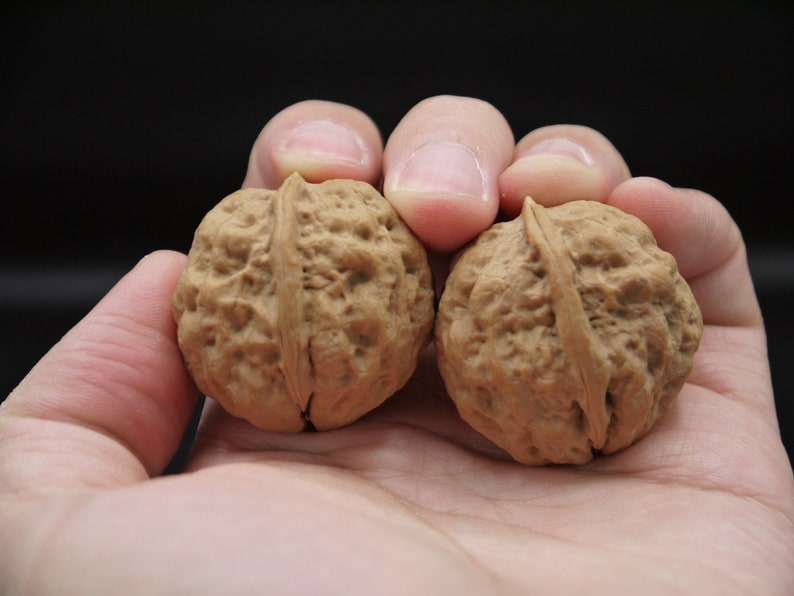Pair of Matched Two Faced Petite Yunnan Iron Walnut Pair 30 mm 小二棱云铁核桃手捻 image 4
