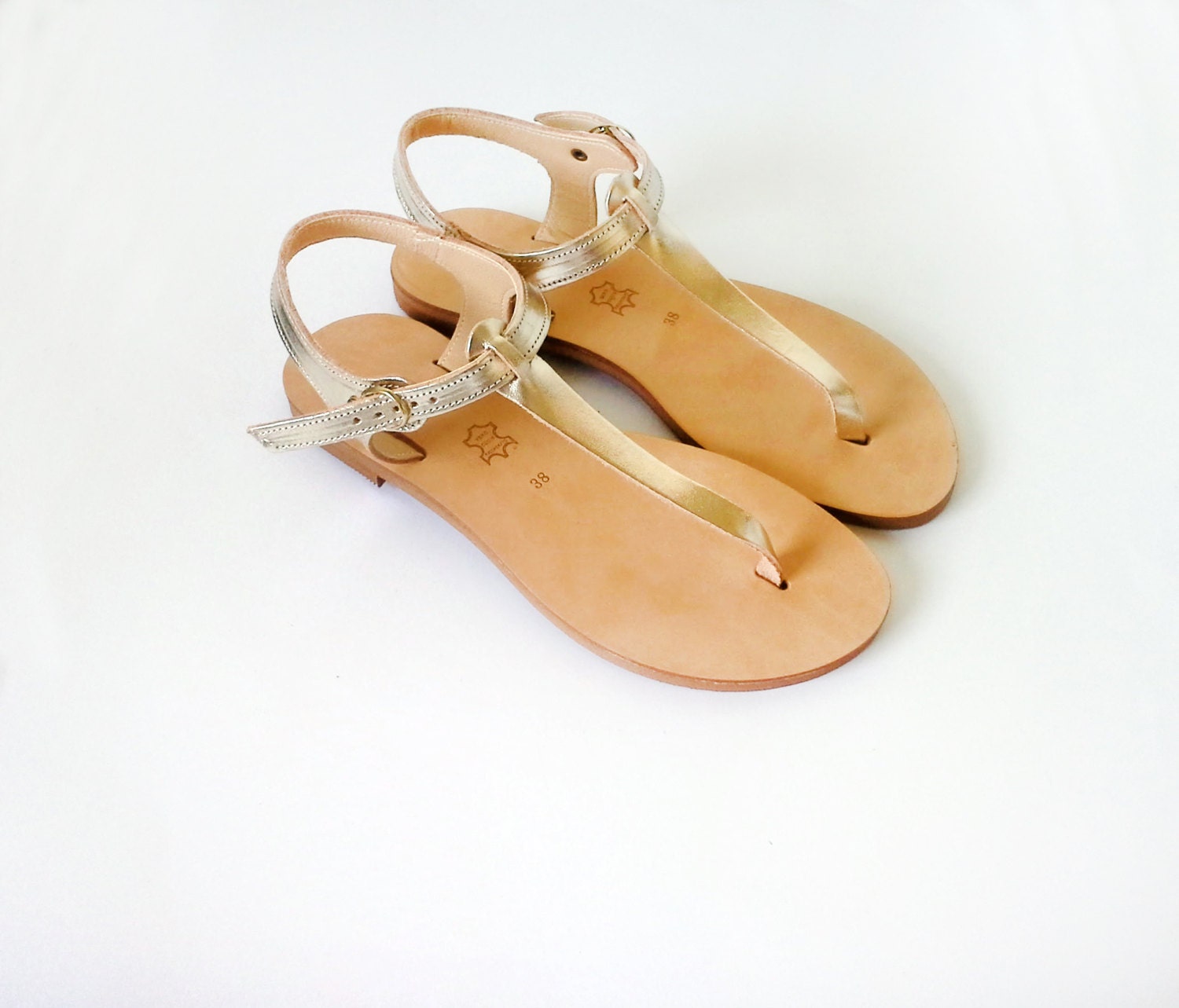 gold t strap flat sandals