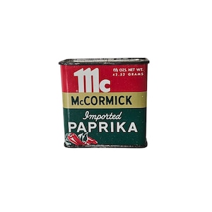 May include: A vintage McCormick paprika tin with a red, gold, and green color scheme. The tin features the McCormick logo, the words "Imported Paprika," and a graphic of red peppers. It weighs 1 1/2 oz. net wt. or 42.52 grams.