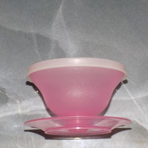 May include: A rustic wooden sign with the text "Welcome to our home" in white lettering. The sign features a distressed finish and a simple, inviting design, perfect for front door decor.