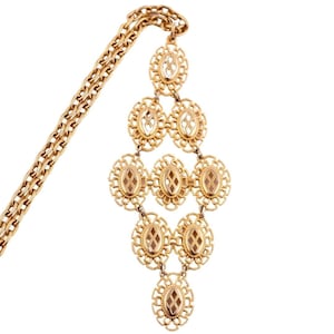 Collar vintage en tono dorado con detalles de filigrana