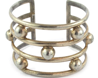 Signed Nettie Rosenstein Deco style cuff in gilt sterling c. 1940
