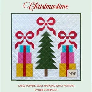 May include: A quilted Christmas-themed pattern featuring a green Christmas tree and two gift boxes with red bows. The text "Christmastime" is displayed at the top, with "TABLE TOPPER / WALL HANGING QUILT PATTERN" and "BY DEB GEHRINGER" at the bottom. A PDF icon is visible.