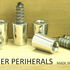May include: Shiny, cylindrical metal beer hardware with threaded interiors and screws. The image shows several pieces, including a screw inserted into one of the cylinders. The text "BEER PERIHERALS" is visible at the bottom.