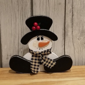 Winter Wood Sitting Snowman