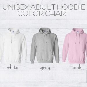 May include: Unisex adult hoodie color chart showing three hoodies in white, grey, and pink.