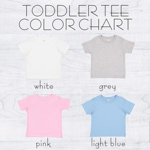 May include: Color chart for toddler tees showing five different colors: white, grey, pink, light blue, and a wolf logo.