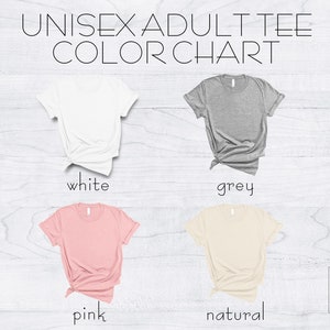May include: Color chart for unisex adult t-shirts. The chart shows four t-shirts in different colors: white, grey, pink, and natural.