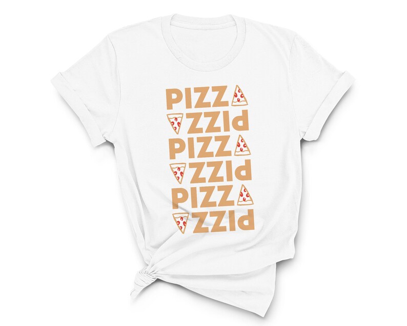 May include: White t-shirt with the word "PIZZA" repeated vertically in a light brown color. Each instance of the word has a pizza slice graphic next to it. The shirt is knotted at the bottom.