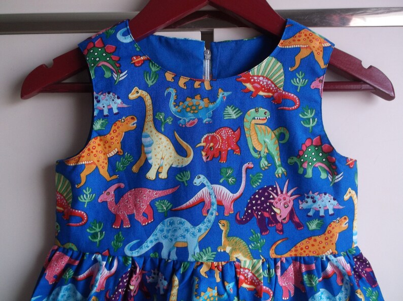 Blue dinosaurs dress image 1