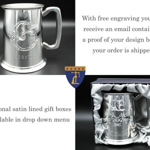 May include: A silver pewter tankard with a personalized engraving. The tankard has a handle and a round base. The engraving includes a letter G with a floral design and the name "Graeme".
