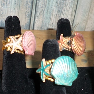 The  mermaids POISON  bronze and teal enameled ring with starfish accents