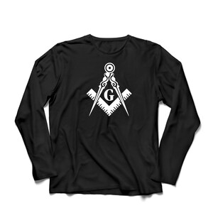 May include: Black long-sleeve t-shirt with a white graphic of a compass and square with a "G" in the center.