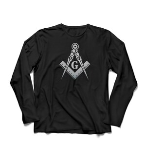May include: Black long-sleeve t-shirt with a silver Masonic symbol, a compass and square with a 'G' in the center.
