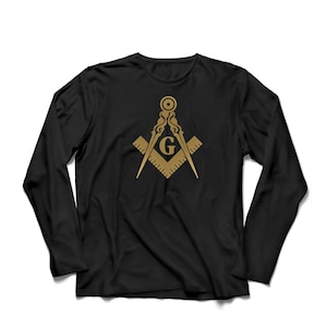 May include: Black long-sleeve t-shirt with a gold-colored Masonic symbol featuring a compass and square with a 'G' in the center.