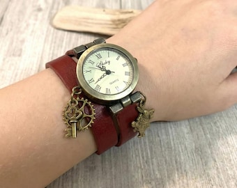 Vintage style women's leather watch with an Alice in Wonderland theme