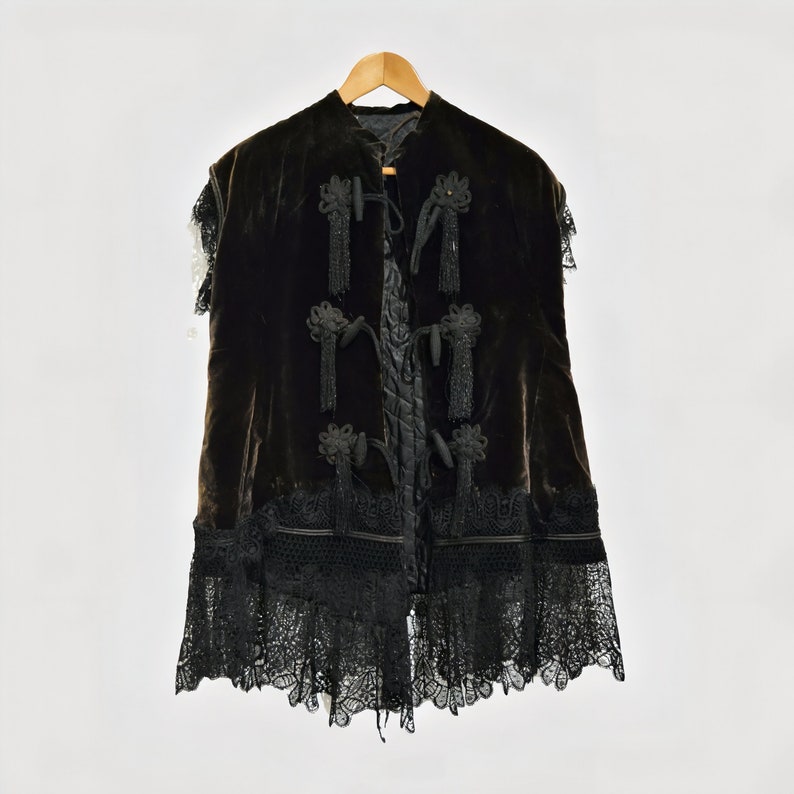 Dark brown velvet jacket with lace hem