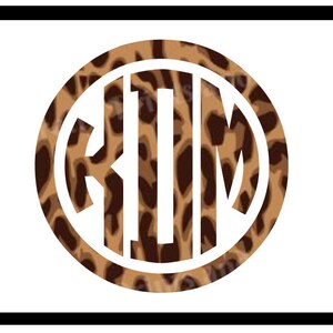 May include: A white monogram with the letters "KIM" in a circle, with a brown and tan leopard print background.