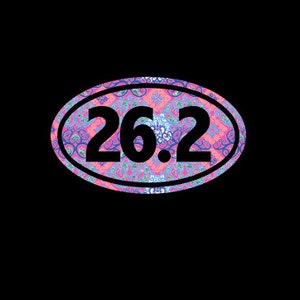 May include: A pink and blue oval sticker with a white outline and the number "26.2" in black.
