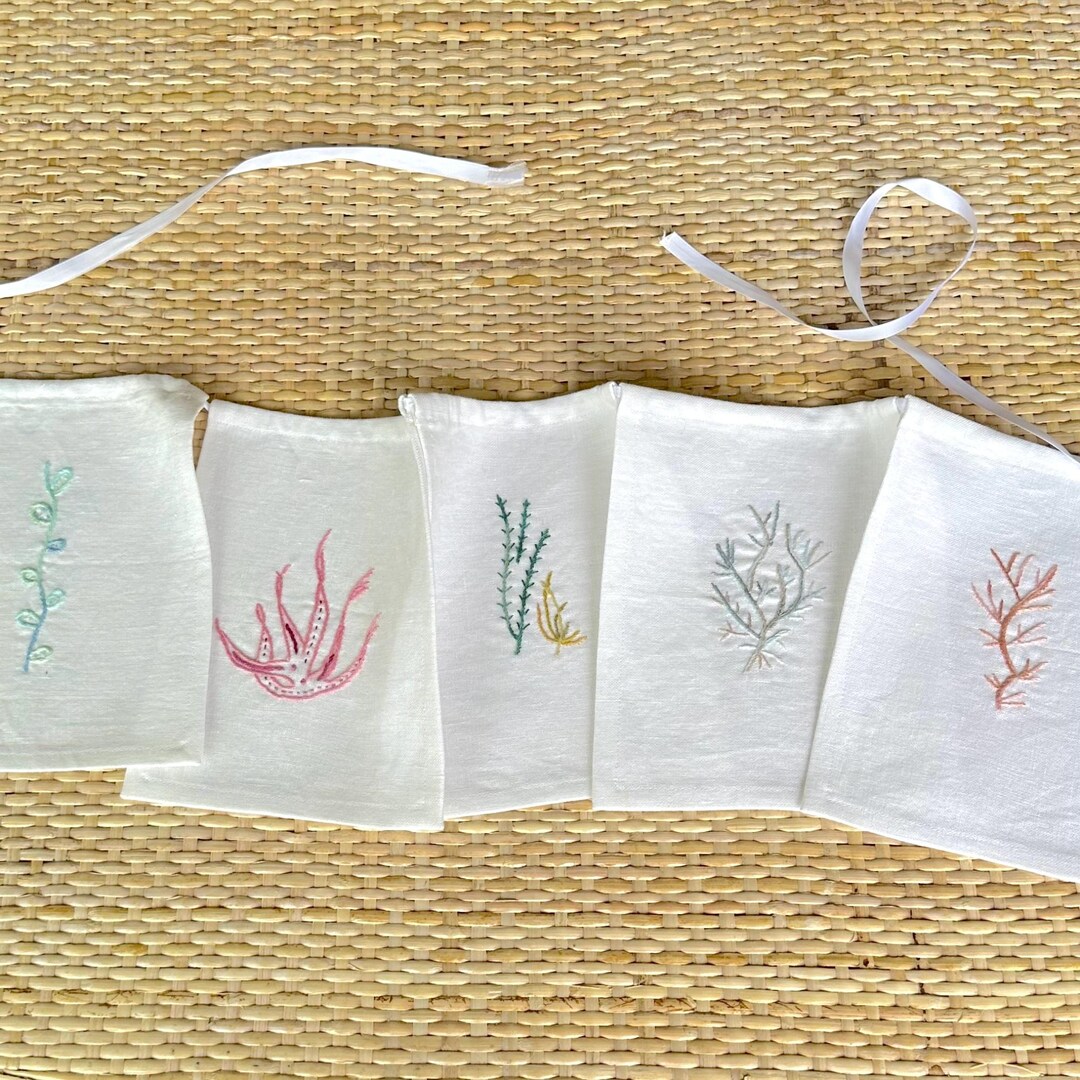 White Linen Wall Hanging With Hand Embroidered Coral Botanical Designs Photo Inspiration