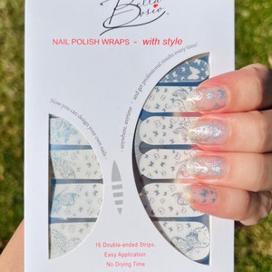Silver Holographic butterfly design over clear Nail Polish Wrap strips for short nails
