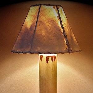 The Little Sawtooth Mountain Log Table Lamp w/Rawhide Shade