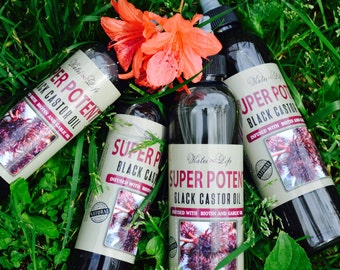 Hair Growth Oil that grows your edges THICKER* grows LONGER hair, add luster, and shine* SUPER POTENTBlack Castor oil infused with biotin