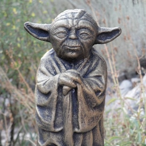 Yoda store lawn statue