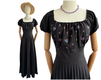 Vintage 1970s Black Maxi Dress with Pleated Skirt and Floral Embroidery | UK Size 8-10