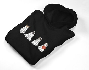 May include: Black hooded sweatshirt featuring a design of four dogs dressed as ghosts for Halloween. The final dog is holding a pumpkin.
