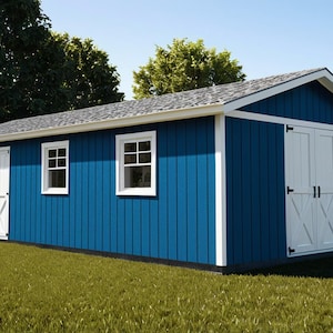 May include: A blue shed with white trim, doors, and windows. The shed has a gabled roof and is set on a grassy lawn. The doors are double doors with black hardware.