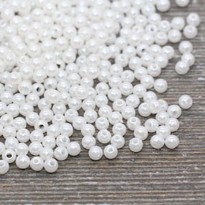  2000 Pieces Pearl Beads for Craft, 4mm Round Loose Fake Pearls  with Hole, Bracelet Pearls for Crafts Jewelry Making Bracelets Necklaces  DIY Hairs Crafts Decoration, Faux Ivory/White,2 Colors